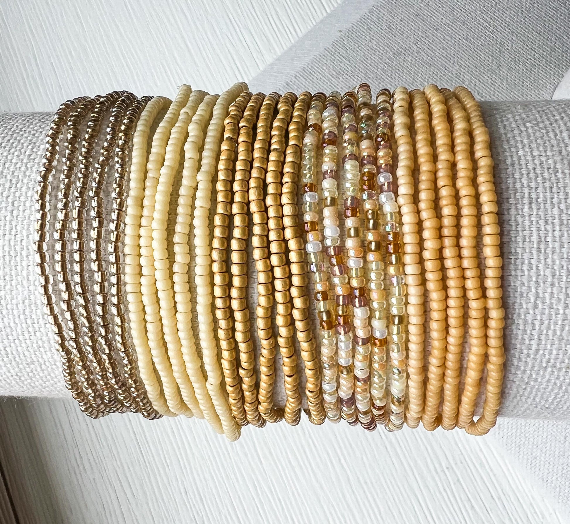 Multi Strand Wrap Bracelet Handmade Seed Bead Design Boho Layering Jewelry Everyday Wear Bracelet Minimalist Beaded Style Neutral Tone Glass Beads Cream Tan Brown Bronze Silver Stretch Elastic Fit Comfortable Stacking Jewelry Contemporary