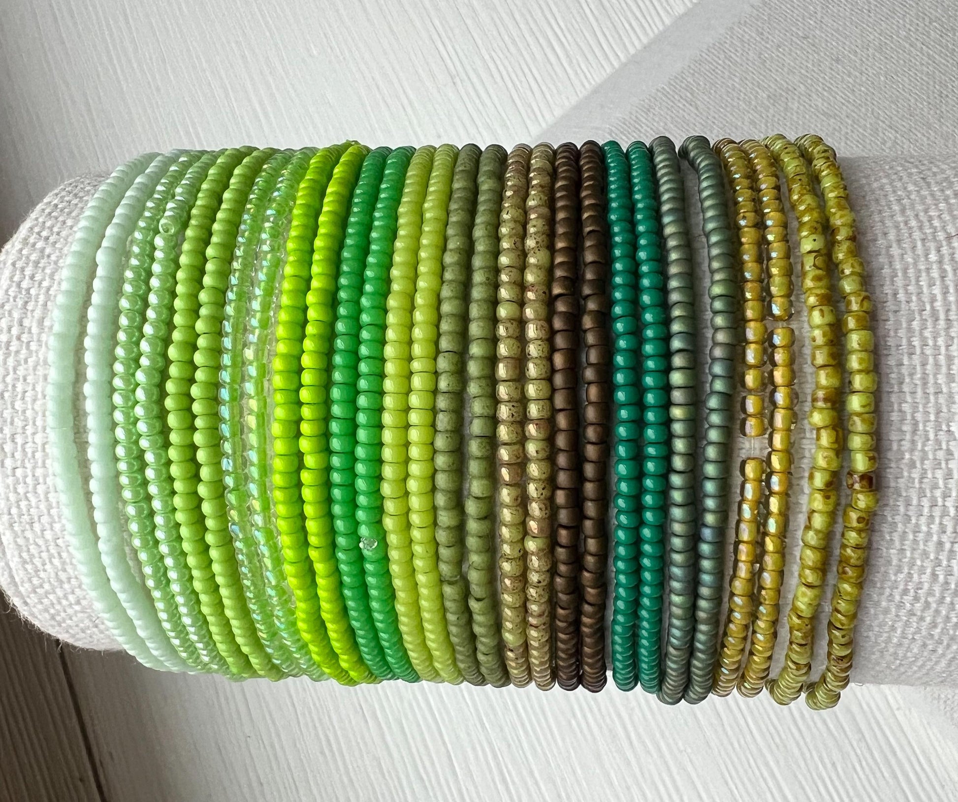 Green Bead Bracelet Stretch Jewelry Design Stackable Bohemian Style Seed Bead Collection Nature Inspired Accessory Forest Mint Tone Colors Summer Layering Bracelet Boho Jewelry Gift Bridesmaid Wedding Accessory Handmade Beaded Bracelet