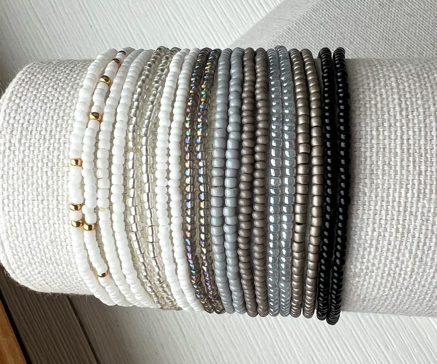 Seed Bead Bracelet Stack Handmade Boho Jewelry Collection Neutral Tone Beaded Bracelets Stretch Design Perfect Everyday Wear Minimalist Glass Bangle Set Stackable Arm Candy Versatile Styling Options Dainty Beaded Details Mix And Match